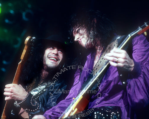 Photo of Tom Keifer and Jeff LaBar of Cinderella in concert in 1989 by Marty Temme
