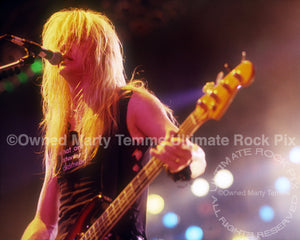 Photo of bassist Eric Brittingham of Cinderella in concert by Marty Temme