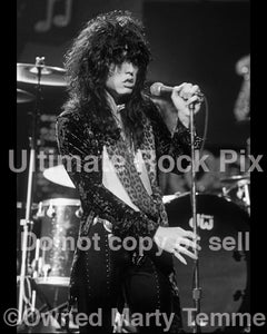 Black and white photo of Tom Keifer of Cinderella onstage in 1990 by Marty Temme