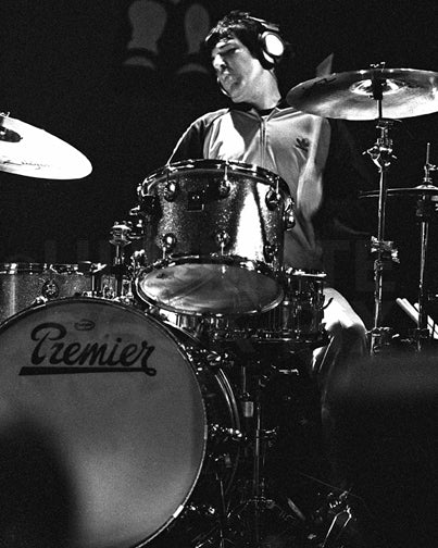 Photo of drummer Clem Burke of Blondie playing Premier drums in concert by Marty Temme