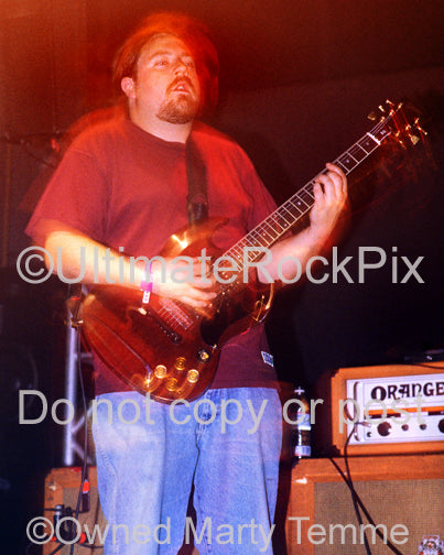 Photo of guitar player Tim Sult of Clutch in concert by Marty Temme