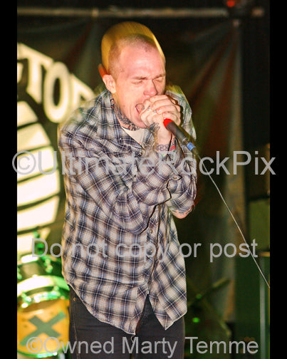 Photo of singer Jacob Bannon of Converge performing onstage in 2008 by Marty Temme
