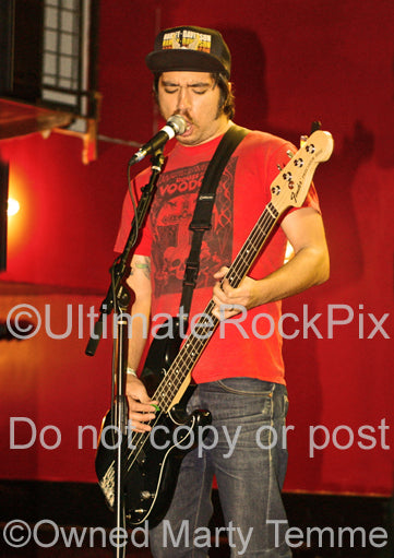 Photo of bass player Nate Newton of Converge onstage in 2008 by Marty Temme