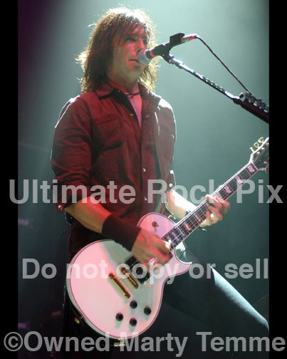 Photo of Damon Johnson of Alice Cooper, Thin Lizzy and Black Star Riders in concert in 2006 by Marty Temme