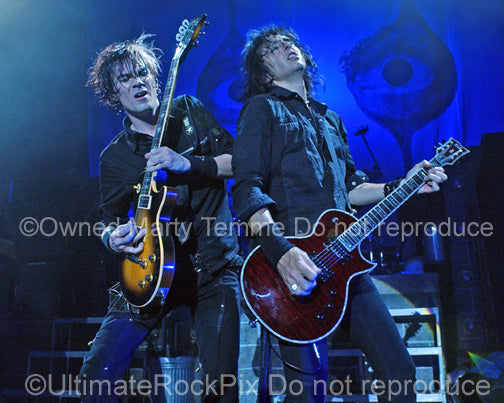 Photo of Keri Kelli and Damon Johnson of Alice Cooper in concert in 2006 by Marty Temme