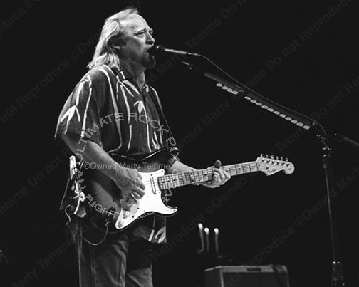 Black and white photo of Stephen Stills of CSNY in concert by Marty Temme