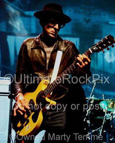Photos of Guitar Player Mike Dimkich of The Cult and Bad Religion Playing a Gibson Les Paul Junior in Concert by Marty Temme