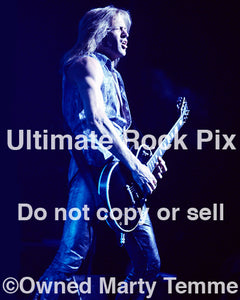 Photo of guitar player Doug Aldrich of Whitesnake in concert by Marty Temme