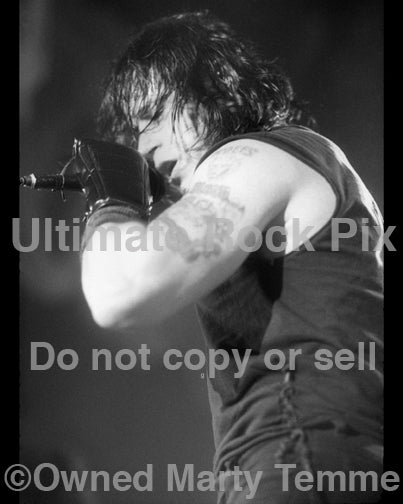 Black and white photo of Glenn Danzig of Danzig in concert in 1989 by Marty Temme