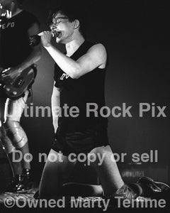 Photo of Mark Mothersbaugh of Devo in concert in 1980 by Marty Temme