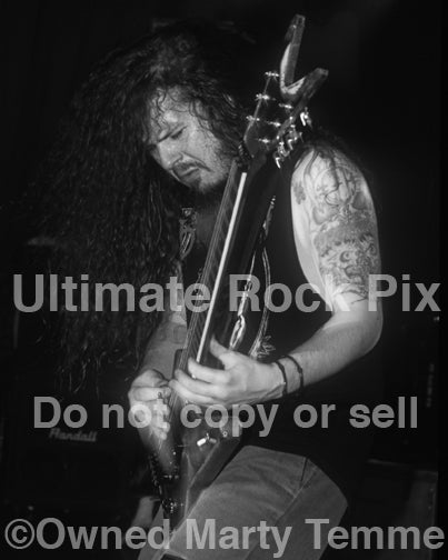 Black and white photo of Diamond Darrell Abbott of Pantera in concert in 1994 by Marty Temme