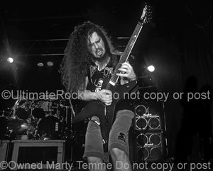 Black and white photo of Diamond Darrell Abbott of Pantera in concert in 1994 by Marty Temme