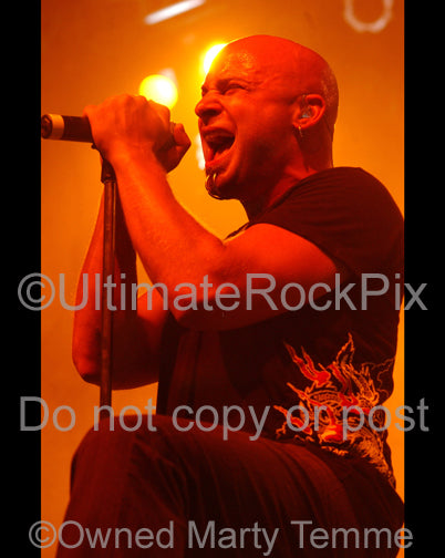 Photo of singer David Draiman of Disturbed in concert by Marty Temme