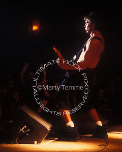 Photo of guitar player George Lynch in concert in 1995 by Marty Temme