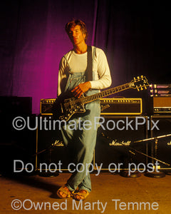 Photo of George Lynch with his ESP guitar during a photo shoot in 1995 by Marty Temme