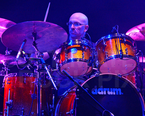 Photo of Ty Dennis playing drums in concert in 2009 by Marty Temme