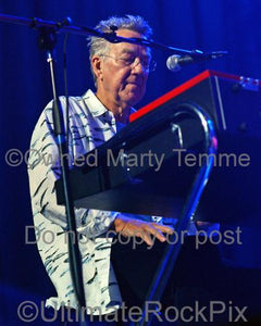 Photos of Keyboardist Ray Manzarek of The Doors Playing a Vox Continental Organ in Concert in 2009 by Marty Temme