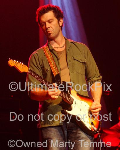 Photos of Doyle Bramhall II playing a Fender Stratocaster in Concert by Photographer Marty Temme