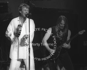 Black and white photo of Ian Gillan and Steve Morse of Deep Purple in concert by Marty Temme