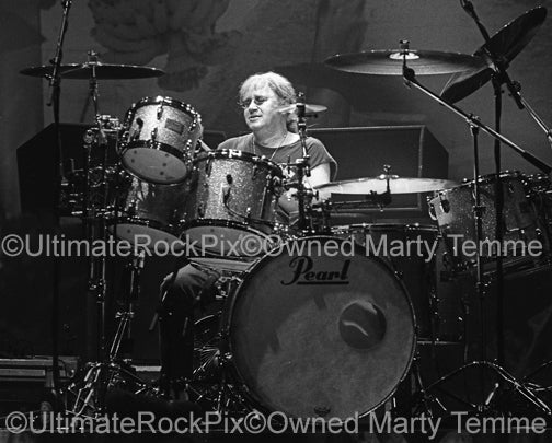 Black and white photo of Ian Paice of Deep Purple in concert in 2004 by Marty Temme