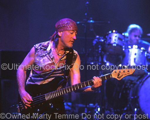 Photo of bass player Roger Glover of Deep Purple in concert in 2004 by Marty Temme