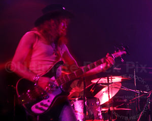 Photo of Roger Glover of Deep Purple in concert in 1972 by Marty Temme