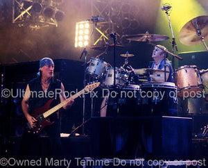 Photo of Roger Glover and Ian Paice of Deep Purple in concert in 2002 by Marty Temme