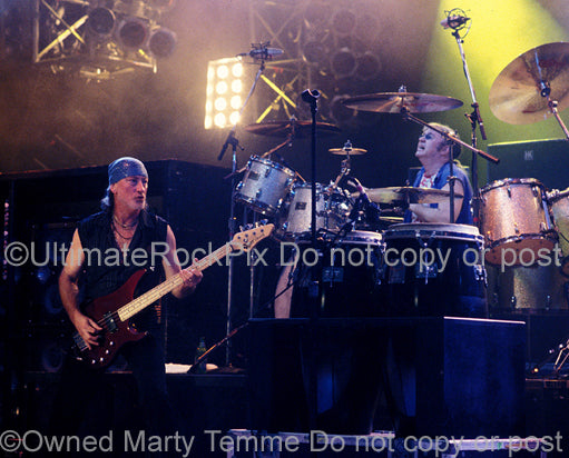 Photo of Roger Glover and Ian Paice of Deep Purple in concert in 2002 by Marty Temme