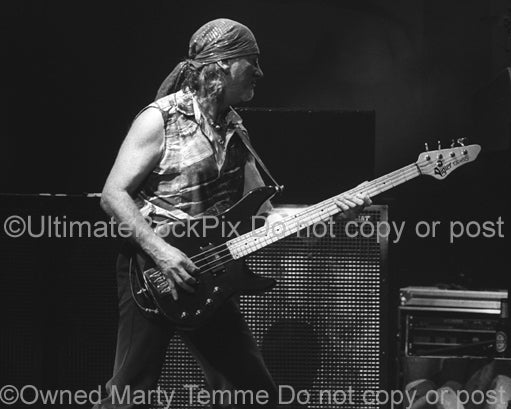 Black and white photo of bass player Roger Glover of Deep Purple in concert in 2004 by Marty Temme