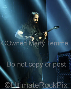 Photo of John Petrucci of Dream Theater in concert in 2014 by Marty Temme