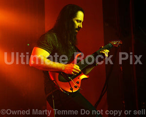 Photo of guitarist John Petrucci of Dream Theater in concert by Marty Temme