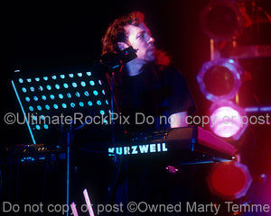 Photo of keyboardist Kevin Moore of Dream Theater in concert in 1994 by Marty Temme