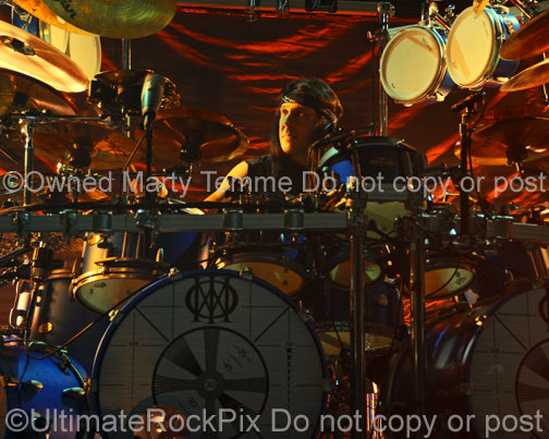 Photo of Mike Mangini of Dream Theater in concert in 2014 by Marty Temme