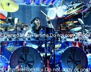 Photo of drummer Mike Mangini of Dream Theater in concert in 2014 by Marty Temme