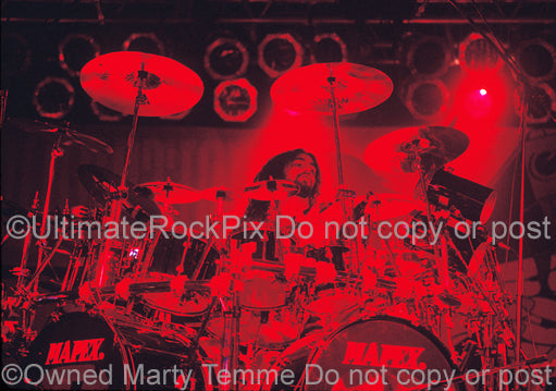 Photo of drummer Mike Portnoy of Dream Theater in concert in 1994 by Marty Temme