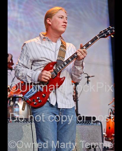 Photos of guitarist Derek Trucks of The Allman Brothers in concert by Marty Temme