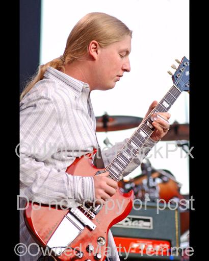 Photos of Guitar Player Derek Trucks of The Allman Brothers Playing Slide in Concert by Marty Temme