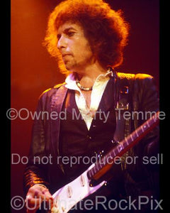 Photos of Musician Bob Dylan Playing a Fender Stratocaster in Concert in 1978 by Marty Temme
