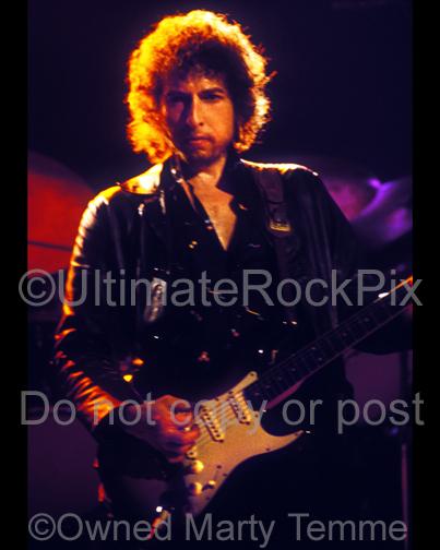 Photos of Musician Bob Dylan Playing a Fender Stratocaster in Concert in 1980 by Marty Temme