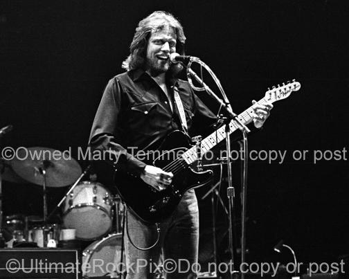 Photo of Don Felder of The Eagles playing a Fender Telecaster in concert in 1980 by Marty Temme
