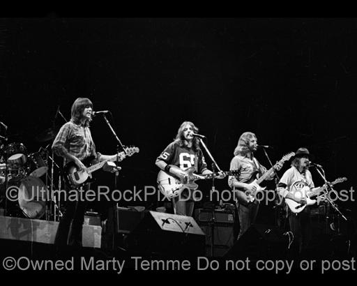 Photos of Randy Meisner, Glenn Frey, Don Felder and Joe Walsh of The Eagles in Concert in 1976 by Marty Temme