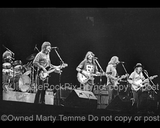 Photos of Randy Meisner, Glenn Frey, Don Felder and Joe Walsh of The Eagles Performing in Concert in 1976 by Marty Temme