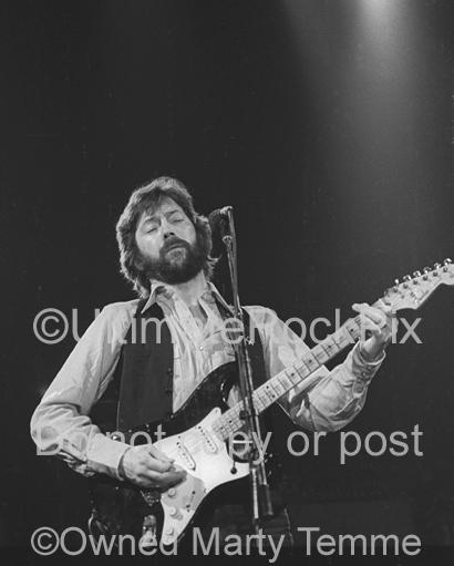 Black and White Photos of Eric Clapton Playing his Black Stratocaster in 1979 by Marty Temme