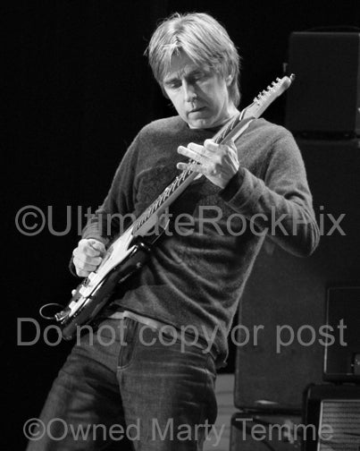 Black and white photo of guitar player Eric Johnson in concert in 2008 by Marty Temme