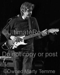 Black and white photo of guitarist Eric Johnson in concert by Marty Temme