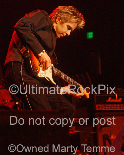 Photo of guitar player Eric Johnson in concert by Marty Temme