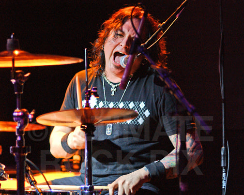 Photo of drummer Chad Stewart of Faster Pussycat in concert by Marty Temme