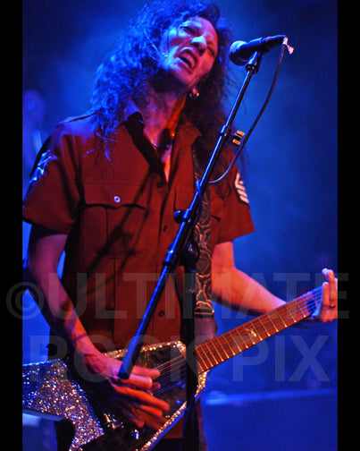 Photo of Xristian Simon of Faster Pussycat in concert by Marty Temme
