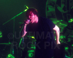 Photo of Burton Bell of Fear Factory singing in concert in 1998 by Marty Temme
