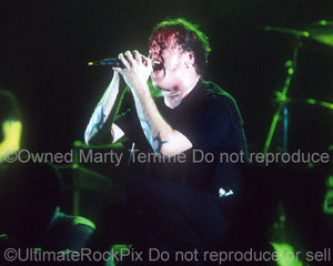 Photo of Burton Bell of Fear Factory in concert in 1998 by Marty Temme